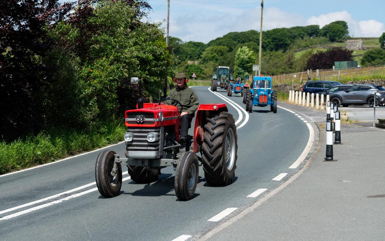 Dozens of tractors followed his coffin so he could have 'one last tractor run'