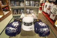 Souvenir items of boxer Manny Pacquiao of the Philippines are displayed for sale inside a store in metro Manila April 24, 2015. REUTERS/Romeo Ranoco