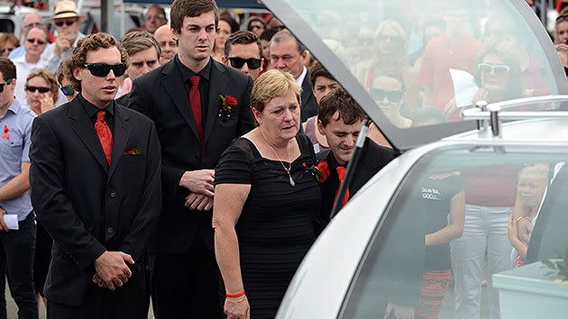 Denise Morcombe and school friend Matt Hannah farewell Daniel Morcombe at St Catherine of Siena Catholic Church at Sippy Downs on the Sunshine Coast.