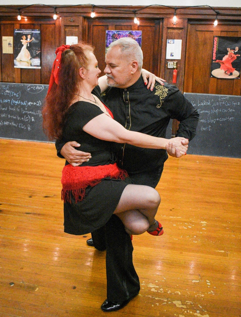 Steven Velasquez and his ballroom dancing student, Lori Disposti of Oak Harbor, practice for a USA Dance exhibition.