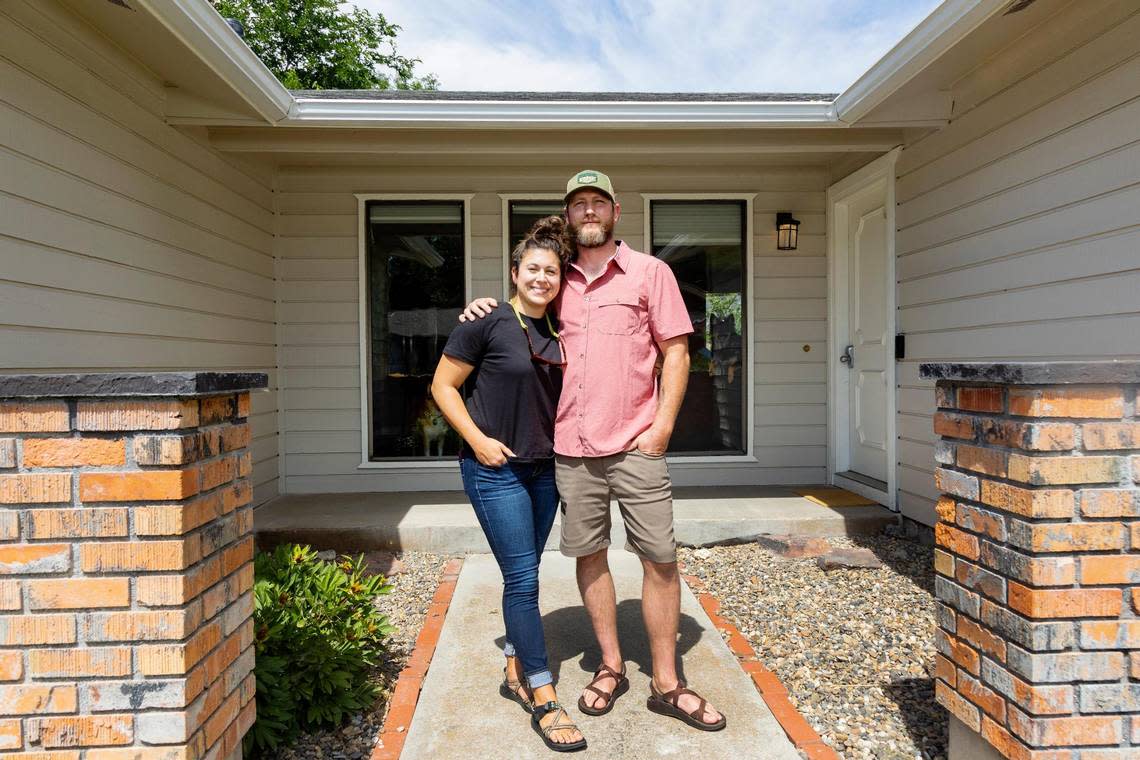 After hearing “horror stories,” about the housing market, Lauren Smith and fiancé Clint Vaughn bought a house a block from where Smith’s parents live.