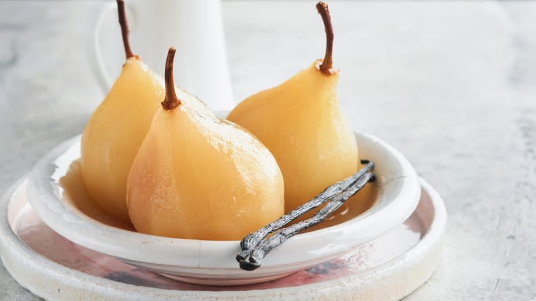 Poached pears in bowl