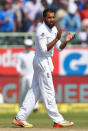 Cricket - India v England - Second Test cricket match - Dr. Y.S. Rajasekhara Reddy ACA-VDCA Cricket Stadium, Visakhapatnam, India - 20/11/16. England's Adil Rashid celebrates the dismissal of India's Ravindra Jadeja. REUTERS/Danish Siddiqui