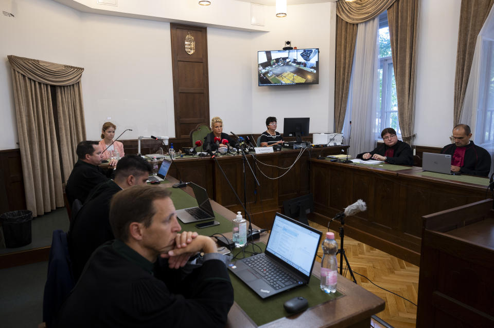 Judge Dr. Leona Németh speaks during the trial of the captain of a river cruise boat in Budapest, Hungary, Tuesday, Sept. 26, 2023. Yuriy Chaplinsky, the captain of a river cruise boat that collided with another vessel in Hungary's capital in 2019, killing at least 27 mostly South Korean tourists has been found guilty of negligence and sentenced to five years and six months in prison. (AP Photo/Denes Erdos)