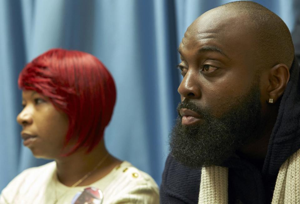 The mother, Lesley McSpadden (L) and father, Michael Brown Sr., of slain teenager Michael Brown, hold a news conference in Geneva November 12, 2014. The family of the slain Missouri teenager Michael Brown said on Wednesday that they had faith in the pending decision of a grand jury and called for supporters to refrain from violence. Michael Brown Sr. said that he and his wife has come to the United Nations, where they testified to the U.N. Committee against Torture, to seek "redress" for the fatal shooting of their unarmed 18-year-old son in August. REUTERS/Denis Balibouse (SWITZERLAND)