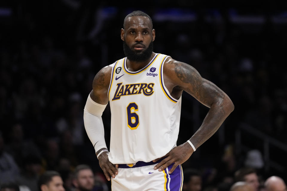 Los Angeles Lakers forward LeBron James (6) stands on the court during the first half of an NBA basketball game against the Philadelphia 76ers in Los Angeles, Sunday, Jan. 15, 2023. (AP Photo/Ashley Landis)