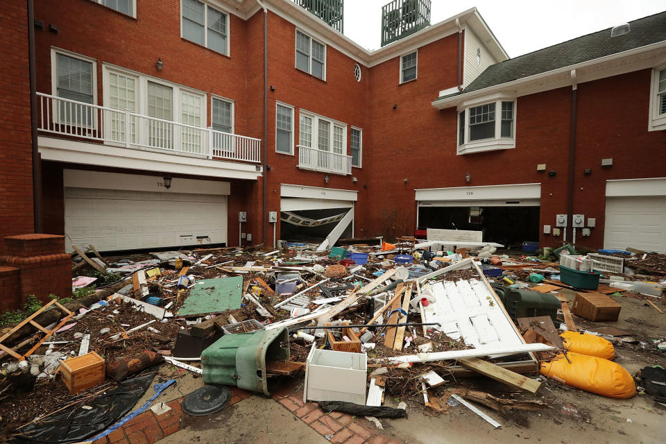 The courtyard at Queen's Point condos is filled with residents' belongings after the storm in New Bern.