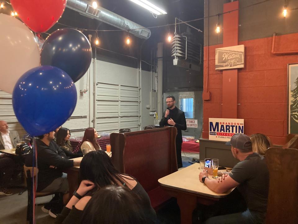 Brandon Martin announces his candidacy for the at-large city council seat at Walter's Brewery on March 2, 2023.