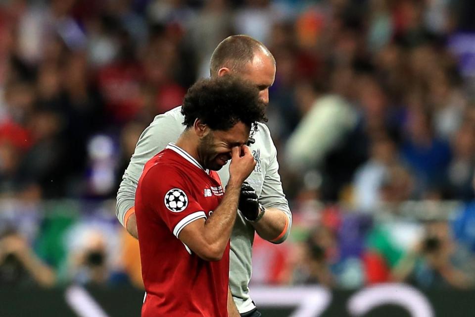 Injury blow: Mohamed Salah depart early with a suspected dislocated shoulder (PA)