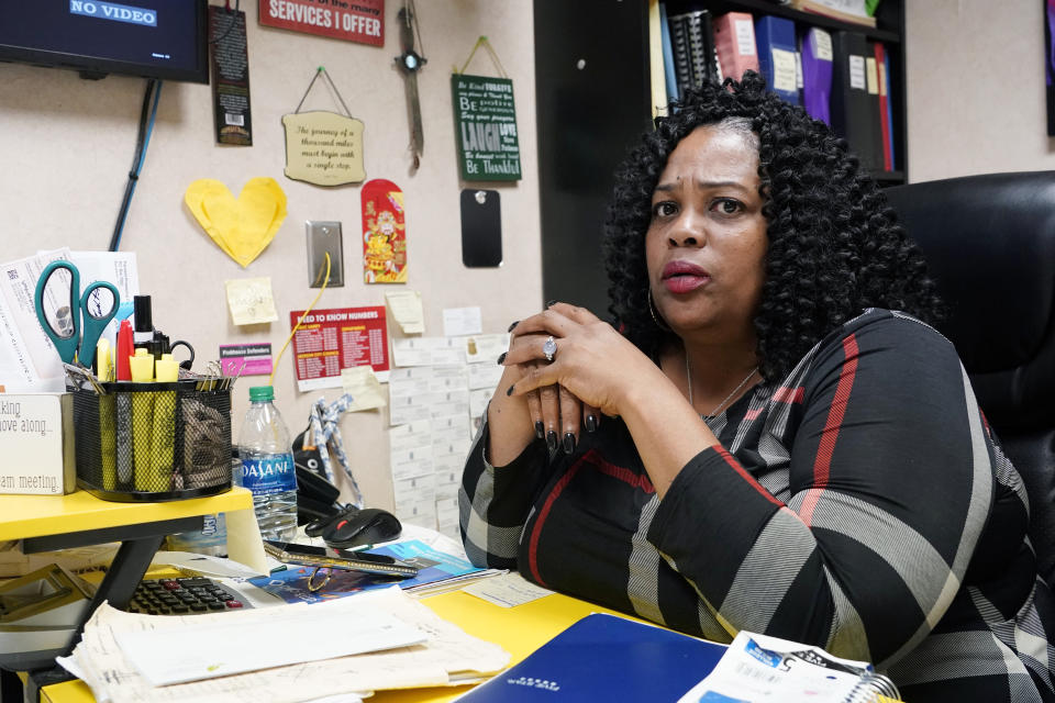 FILE - Shannon Brewer, Jackson Women's Health Organization director, sits in her office at the Jackson, Miss., clinic on May 19, 2021. She believes politicians advocating to end abortion are also trying to eliminate resources for single mothers. As a Black woman and a mother of six, she said she understands the experiences of women seeking abortion. (AP Photo/Rogelio V. Solis, File, File)