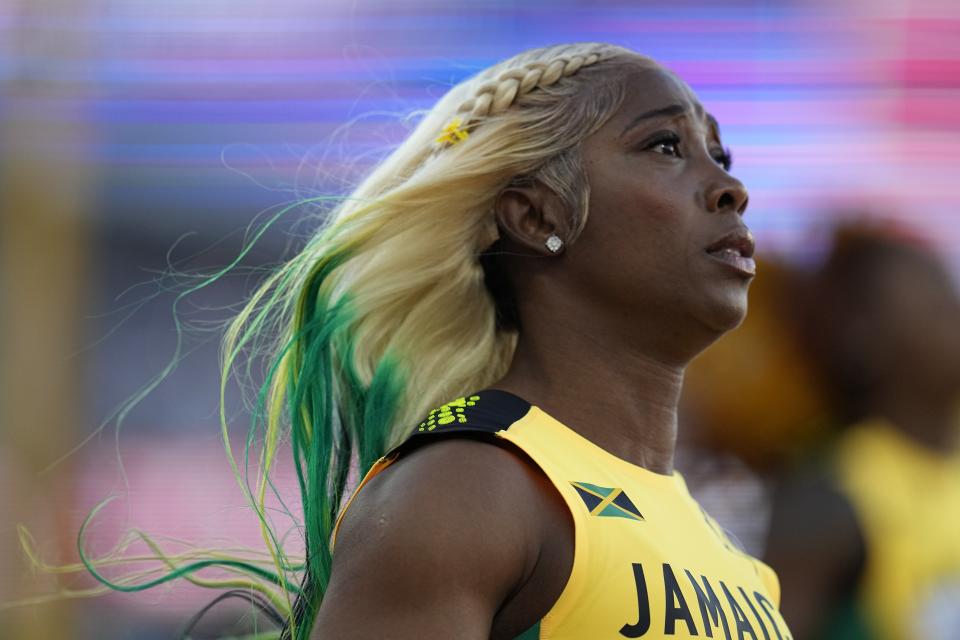 Shelly-Ann Fraser-Pryce, of Jamaica, reacts after winning Gold in the final in the women's 100-meter run at the World Athletics Championships on Sunday, July 17, 2022, in Eugene, Ore. (AP Photo/Ashley Landis)