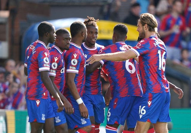 Wilfried Zaha, centre, celebrates his second goal