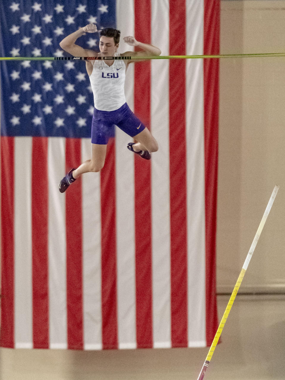 FILE - In this March 8, 2019, file photo, LSU's Mondo Duplantis competes in the men's pole vault during the NCAA Division I indoor track and field championships in Birmingham, Ala. The three biggest names in men’s pole vault will compete against each other from their own backyards, Sunday, May 3, 2020, in a rare sporting event during the coronavirus pandemic. Video links will connect world record holder Mondo Duplantis, world champion Sam Kendricks and former Olympic champion Renaud Lavillenie. World Athletics calls it “The Ultimate Garden Clash” and will stream it on social media. (AP Photo/Vasha Hunt, File)