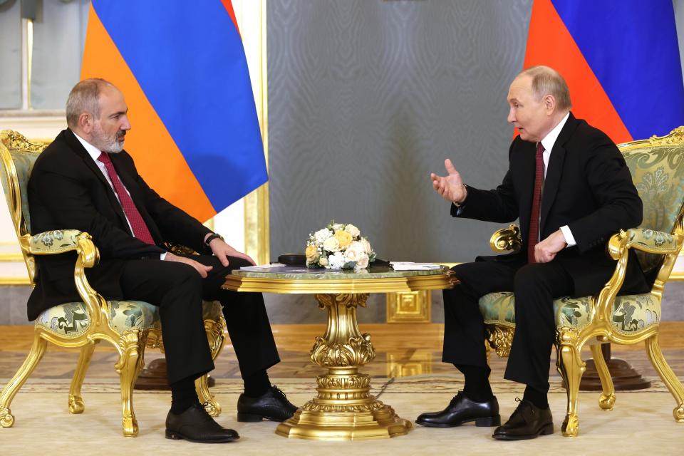 FILE Russian President Vladimir Putin, right, gestures while speaking to Armenian Prime Minister Nikol Pashinyan on the sidelines of a meeting of the Eurasian Economic Union at the Kremlin in Moscow, Russia, on Wednesday, May 8, 2024. The leader of Armenia has declared his intention to pull out of a Russia-dominated security alliance of several ex-Soviet nations as tensions rise between the two allies. (Alexander Shcherbak, Sputnik, Kremlin Pool Photo via AP, File)