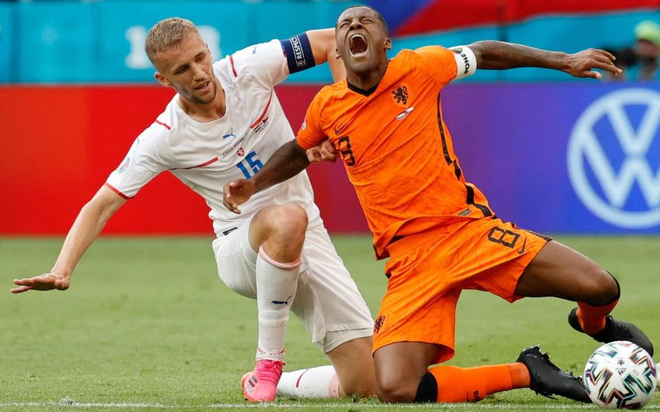 A tough, close contest: Czech Republic's midfielder Tomas Soucek (L) fouls Netherlands' midfielder Georginio Wijnaldum - AFP