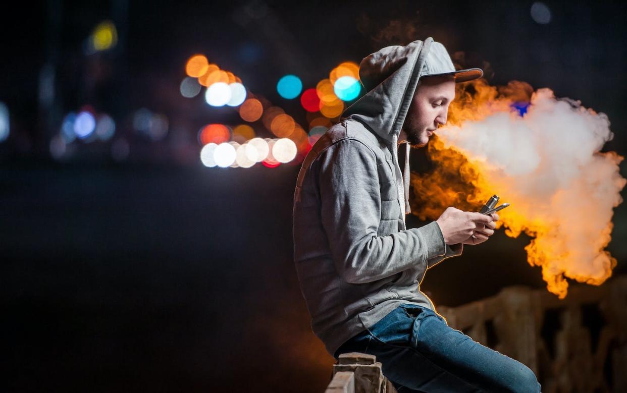 <a href="https://www.shutterstock.com/image-photo/young-man-smoking-electronic-cigarette-looking-579691078" rel="nofollow noopener" target="_blank" data-ylk="slk:Shutterstock;elm:context_link;itc:0;sec:content-canvas" class="link ">Shutterstock</a>