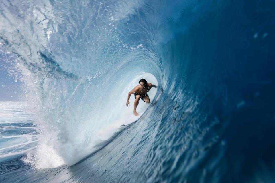 <span>Australian-born Connor O'Leary surfs Teahupo’o in Tahiti, French Polynesia in preparation for the 2024 Paris Olympics where he will represent Japan.</span><span>Photograph: Ben Thouard/AFP/Getty Images</span>