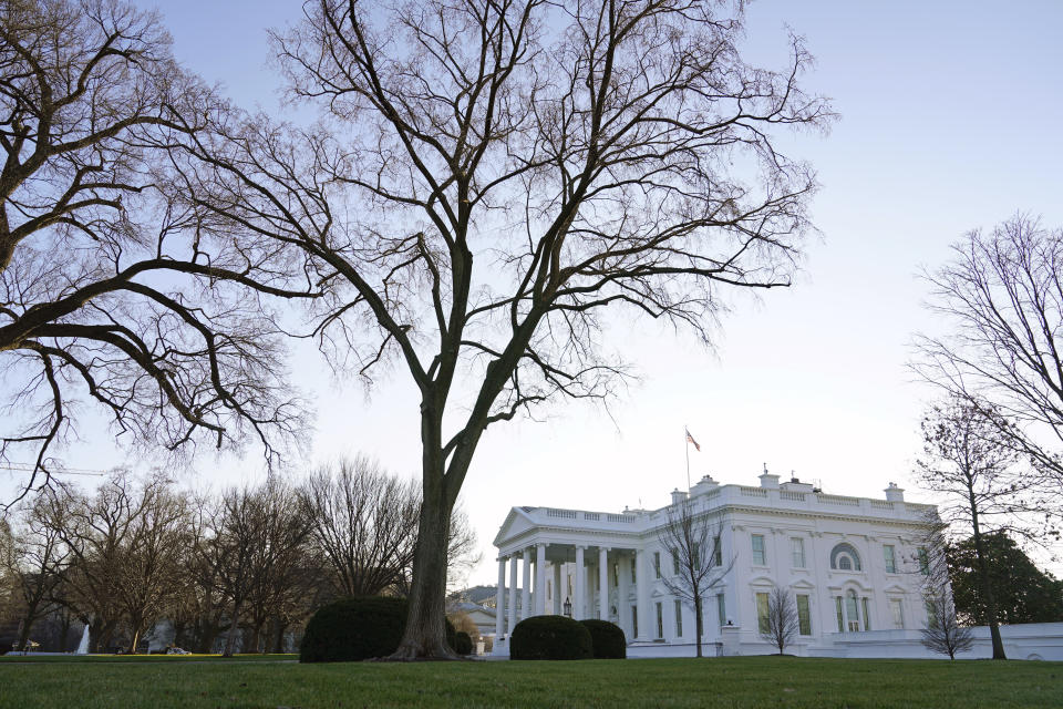 An American flag flies over the White House in Washington, Thursday, Jan. 7, 2021. (AP Photo/Patrick Semansky)