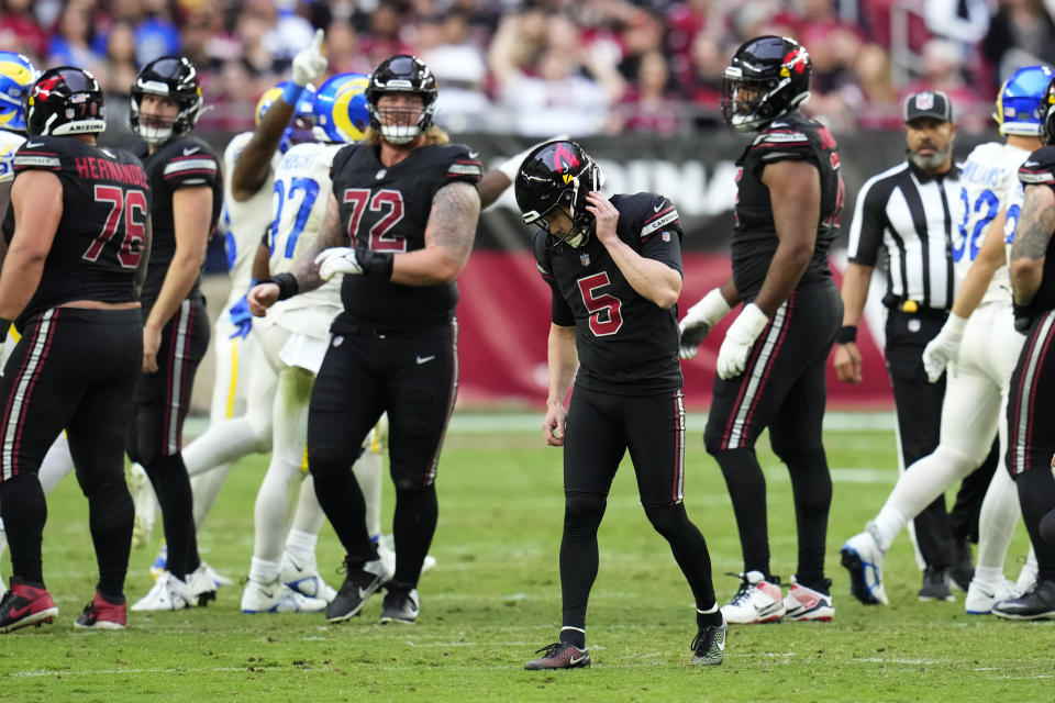 Arizona Cardinals place kicker Matt Prater (5) reacts after missing a field goal kick during the second half of an NFL football game against the Los Angeles Rams, Sunday, Nov. 26, 2023, in Glendale, Ariz. (AP Photo/Ross D. Franklin)