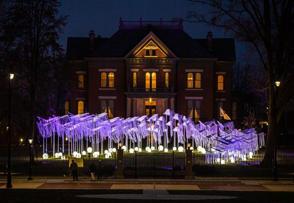 A memorial commissioned by Illinois First Lady MK Pritzker and Governor JB Pritzker for the lives lost to the pandemic is illuminated marking the one year anniversary of the state's first known COVID-19 death on the north lawn of the Governor's Mansion in Springfield, Ill. on March 16, 2021.