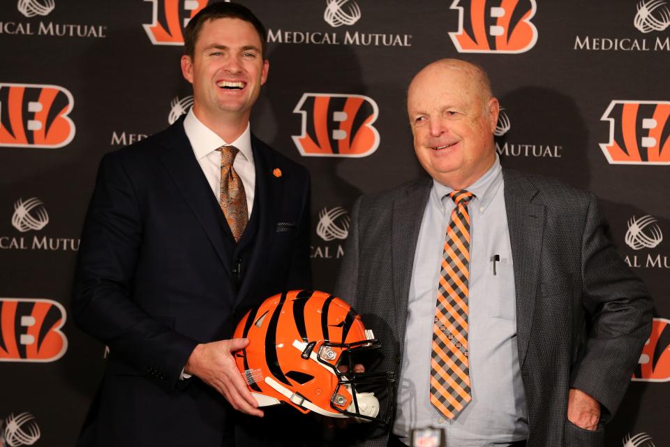 Zac Taylor, left, and Cincinnati Bengals president Mike Brown, right, pose for a photo after Taylor was named the 10th head coach in Cincinnati Bengals team history, Tuesday, Feb. 5, 2019, at Paul Brown Stadium in Cincinnati. 