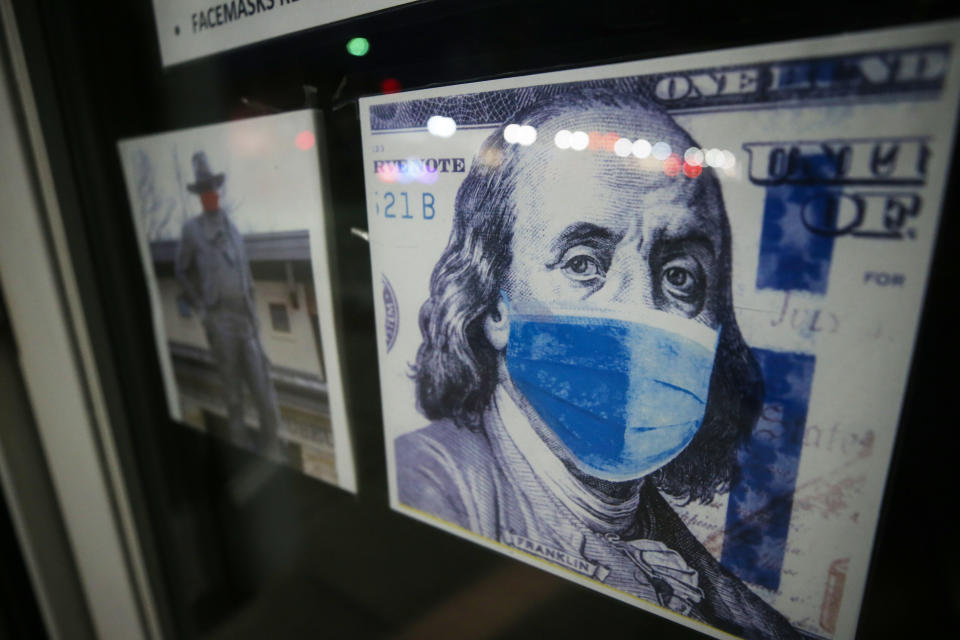 The Ben Franklin store displays an image of Franklin wearing a face mask on Oct. 29 in Winterset, Iowa. (Mario Tama/Getty Images)