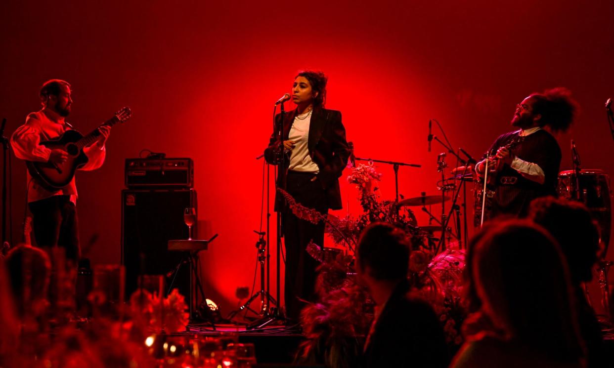 <span>‘Running tens of thousands in debt from the tour and I’m being told that it’s normal’ … Arooj Aftab performing in Brooklyn in June 2023.</span><span>Photograph: Madison Voelkel/BFA.com/Shutterstock</span>