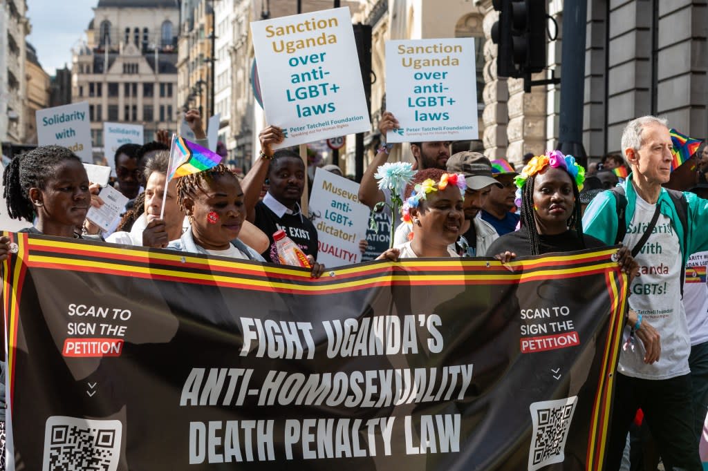 Human rights and LGBT+ rights activist Peter Tatchell (r) accompanies campaigners calling for Uganda to be sanctioned for its anti-LGBT+ laws during the Pride in London parade on 1 July 2023 in London, United Kingdom. (photo by Mark Kerrison/In Pictures via Getty Images)