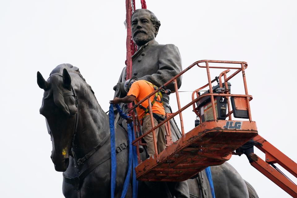 Crews getting ready to remove one of the country's largest remaining monuments to the Confederacy, a towering statue of Confederate General Robert E. Lee on Monument Avenue, on Sept. 8, 2021, in Richmond, Va.