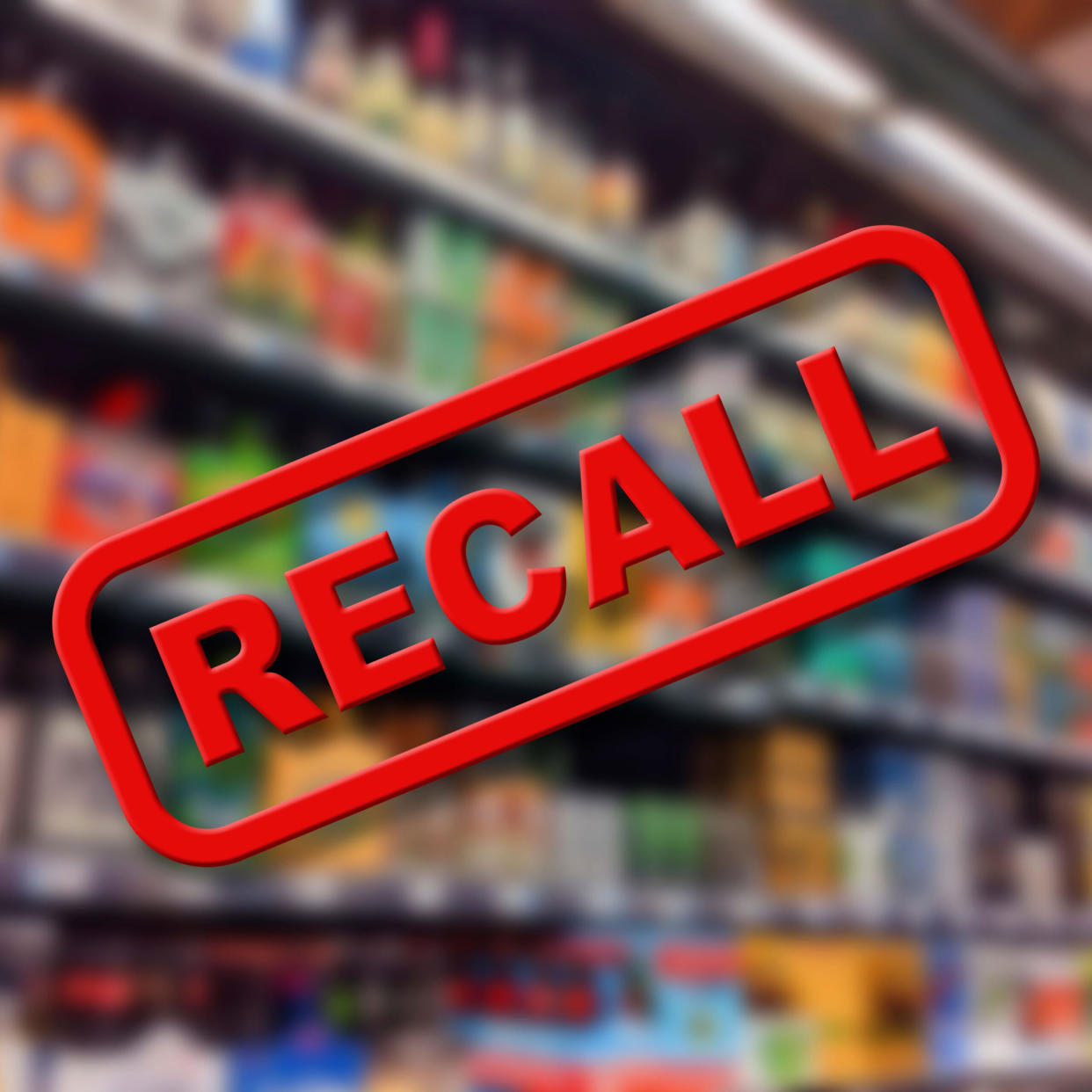 Recall sign over grocery shelves