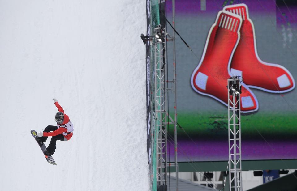 Snowboarder Silje Norendal, of Norway, makes a practice jump, Feb. 10, 2016 in advance of the Big Air at Fenway skiing and snowboarding U.S. Grand Prix tour event in Fenway Park, in Boston. Fenway Park has kept busy in the offseason with hockey, football and other events that have turned one of baseball’s crown jewels into a year-round venue. | Steven Senne, Associated Press