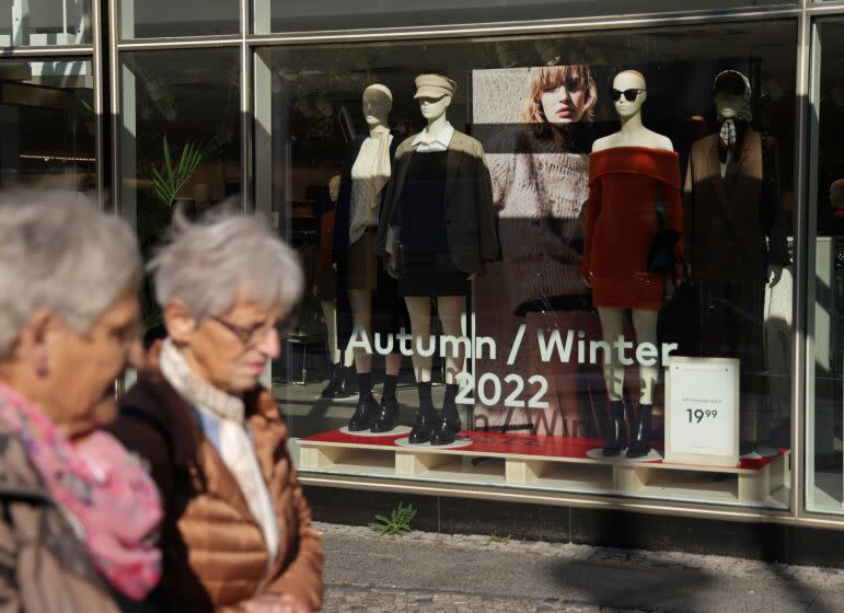BERLIN, GERMANY - SEPTEMBER 30: Two elderly women walk past a clothing store on September 30, 2022 in Berlin, Germany. Inflation in Germany reaches 10.9% in September compared to one year ago, its biggest jump since 1951. Meanwhile leading economists are expecting the German economy to slip into recession within the next year. Both woes have been brought on mainly by skyrocketing energy prices due to consequences stemming from Russia's ongoing war in Ukraine. (Photo by Sean Gallup/Getty Images)