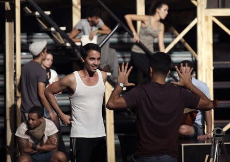 Actors take part in a rehearsal for the musical "Rent" in a theatre in Havana November 25, 2014. REUTERS/Enrique De La Osa