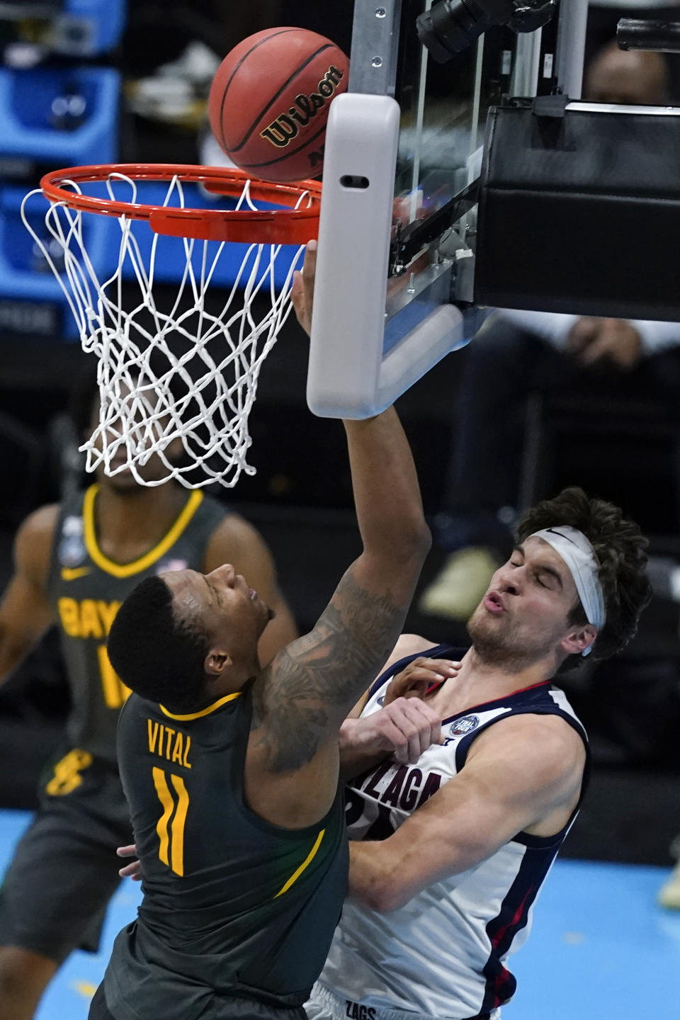 Baylor guard Mark Vital (11) shoots over Gonzaga forward Corey Kispert (24) during the second half of the championship game in the men's Final Four NCAA college basketball tournament, Monday, April 5, 2021, at Lucas Oil Stadium in Indianapolis. (AP Photo/Darron Cummings)