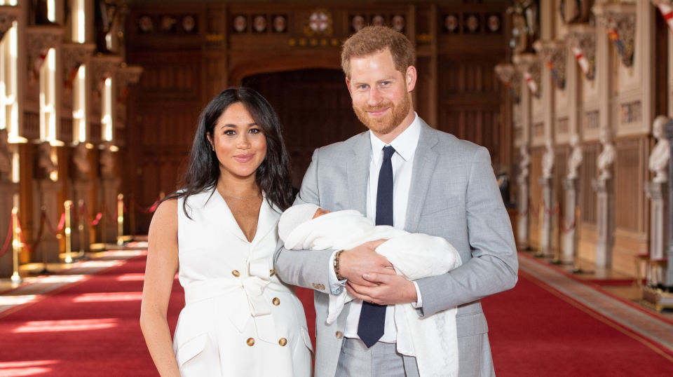 Meghan Markle and Prince Harry pose with their newborn son in Windsor Castle [Photo: PA]