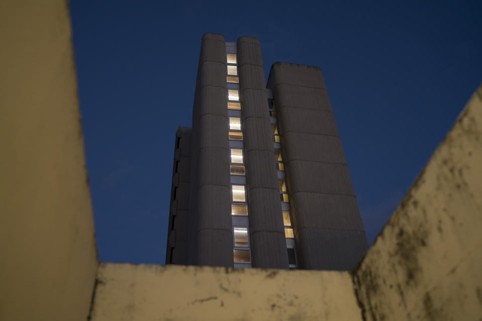 In this Dec.13 2019 photo, The medical intern residency is pictured at sunset. Interns partake in a communal lifestyle in the nine floor building located within the hospital gounds of La Timone hospital, in Marseille, southern France. In a hospital in Marseille, student doctors are holding an exceptional, open-ended strike to demand a better future. France’s vaunted public hospital system is increasingly stretched to its limits after years of cost cuts, and the interns at La Timone - one of the country’s biggest hospitals - say their internships are failing to prepare them as medical professionals. Instead, the doctors-in-training are being used to fill the gaps. (AP Photo/Daniel Cole)