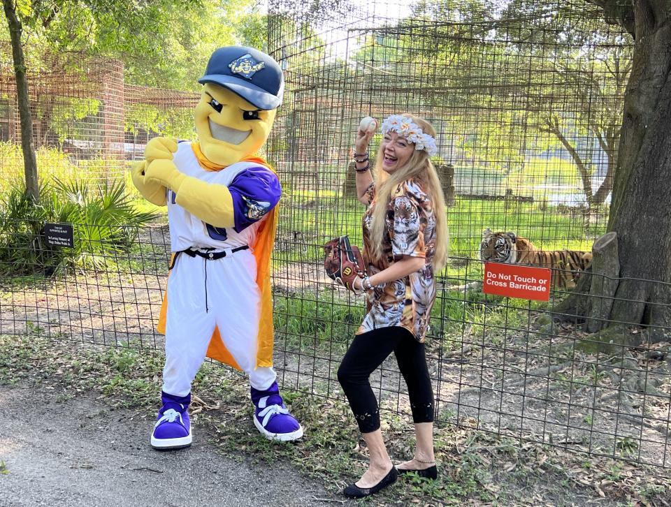 "Tiger King's" Carole Baskin poses with the mascot of the Fort Myers Mighty Mussels, Mussel Man.