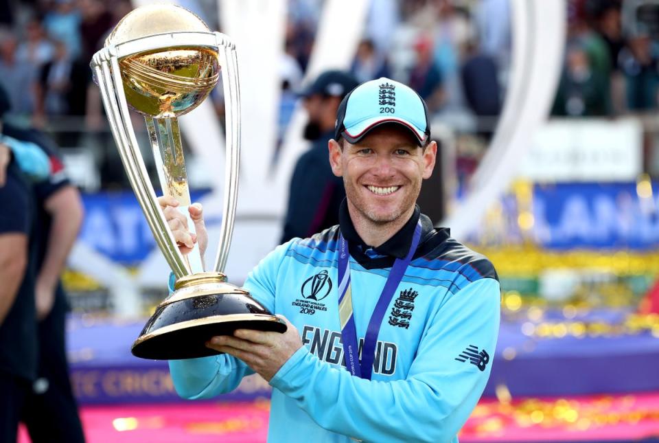 Morgan holds the World Cup after beating New Zealand at Lord’s in 2019  (PA)