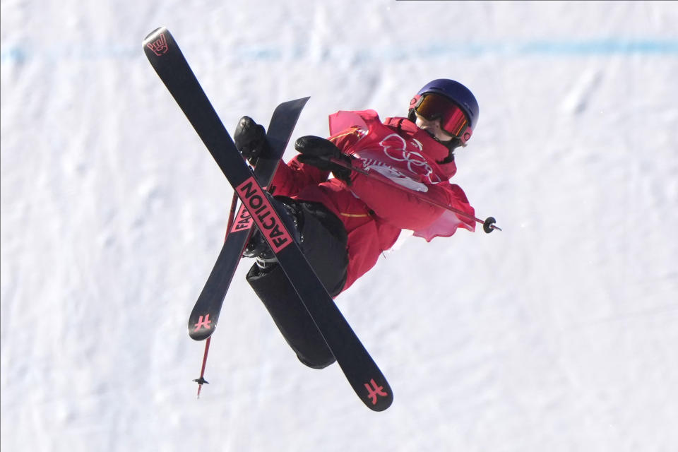 China's Eileen Gu competes during the women's slopestyle qualification at the 2022 Winter Olympics, Monday, Feb. 14, 2022, in Zhangjiakou, China. (AP Photo/Francisco Seco)