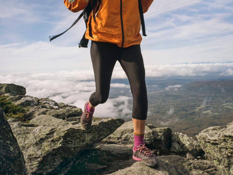 A woman hiking on Mount Mansfield in Vermont