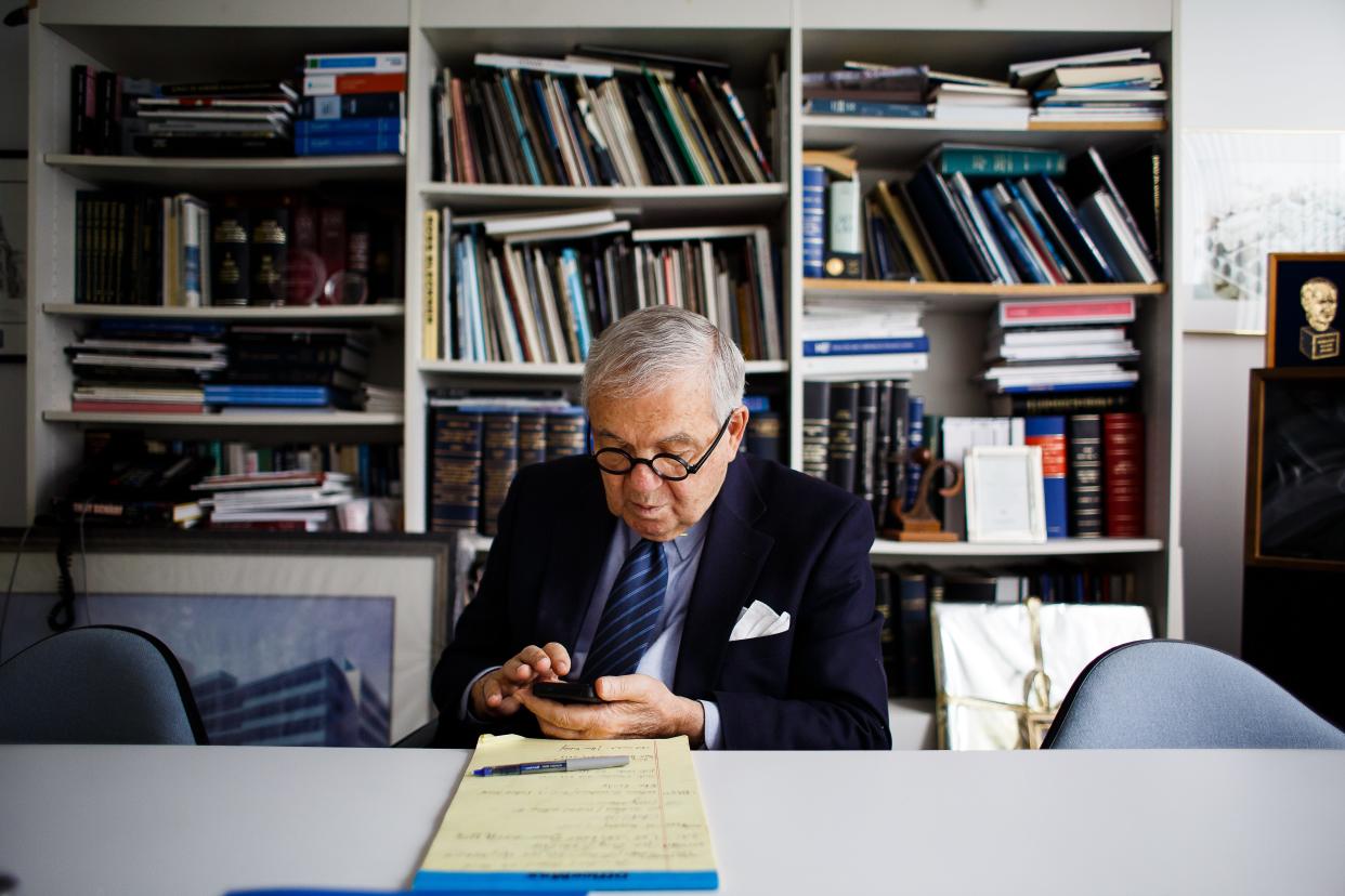 Philanthropist and investor John Pappajohn works in his office in 2016.