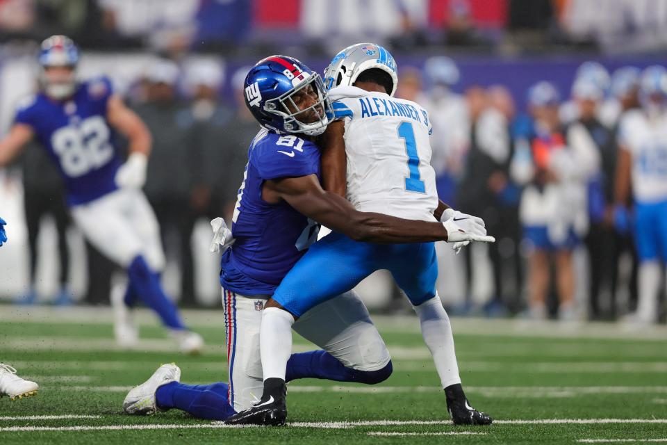 Aug 8, 2024; East Rutherford, New Jersey, USA; New York Giants wide receiver Miles Boykin (81) tackles Detroit Lions wide receiver Maurice Alexander (1) during a punt return at MetLife Stadium. Mandatory Credit: Scott Rausenberger-USA TODAY Sports