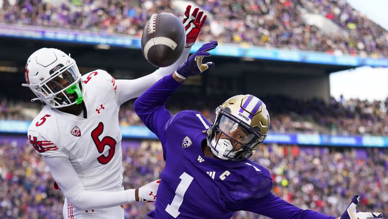 Washington wide receiver Rome Odunze (1) can’t make a catch in the end zone against Utah cornerback Zemaiah Vaughn (5) during the first half of a game Saturday, Nov. 11, 2023, in Seattle. 
