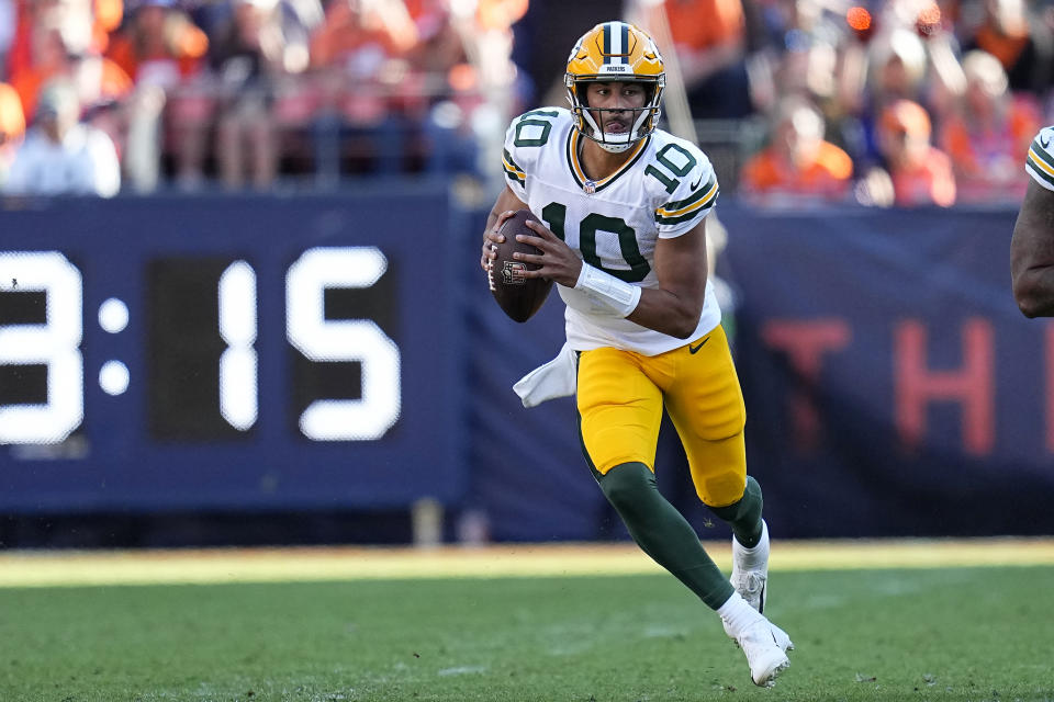 Green Bay Packers quarterback Jordan Love (10) looks down field during the first half of an NFL football game against the Denver Broncos in Denver, Sunday, Oct. 22, 2023. (AP Photo/Jack Dempsey)