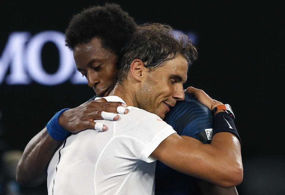 Rafael Nadal consoles France’s Gael Monfils after winning