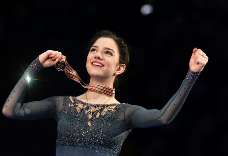 Gold medallist Evgenia Medvedeva of Russia celebrates on the podium after the woman's Free Skating event at the ISU World Figure Skating Championships in Helsinki, on March 31, 2017 Evgenia Medvedeva of Russia won the Gold medal ahead of Silver medallist Canada's Kaetlyn Osmond and Bronze medallist Canada's Gabrielle Daleman