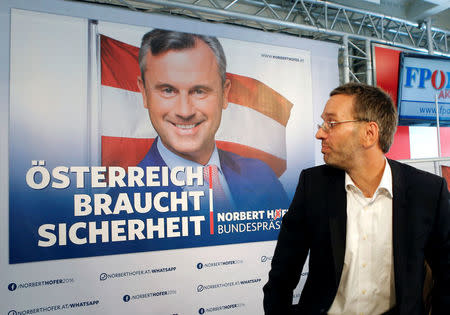 Austrian Freedom Party (FPOe) Secretary General Herbert Kickl presents campaign posters of FPOe candidate Norbert Hofer for a re-run of the run-off presidential election in Vienna, Austria August 24, 2016. Poster reads "Austria needs safety". REUTERS/Heinz-Peter Bader