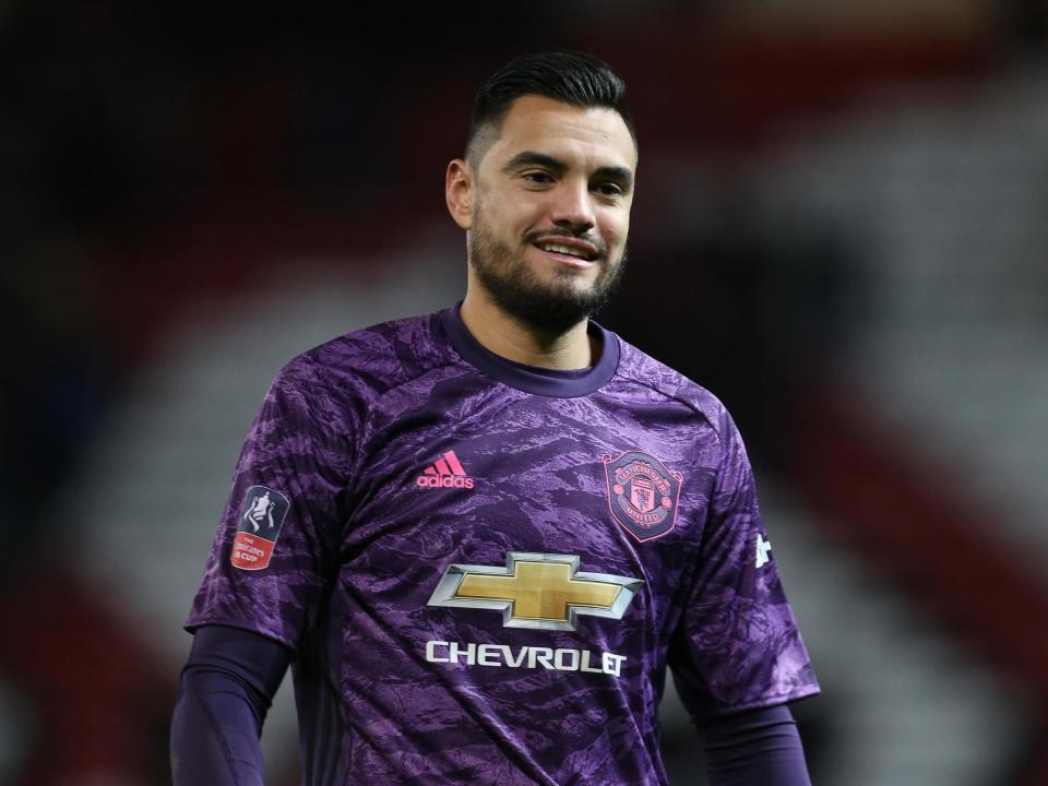 Manchester United goalkeeper Sergio Romero: Manchester United via Getty Imag