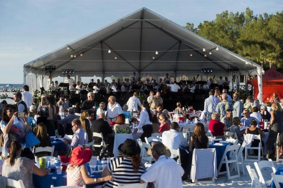 Guests await the beginning of A Symphony on the Sand performance in 2016 at Coquina Beach on Anna Maria Island.