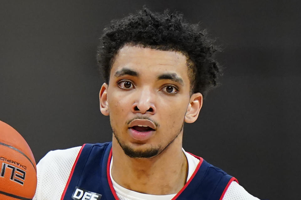 FILE - In this Feb. 20, 2021, file photo, Connecticut's James Bouknight plays during an NCAA college basketball game against Villanova in Villanova, Pa. Bouknight was selected by the Charlotte Hornets in the NBA draft Thursday, July 29, 2021. (AP Photo/Matt Slocum, File)